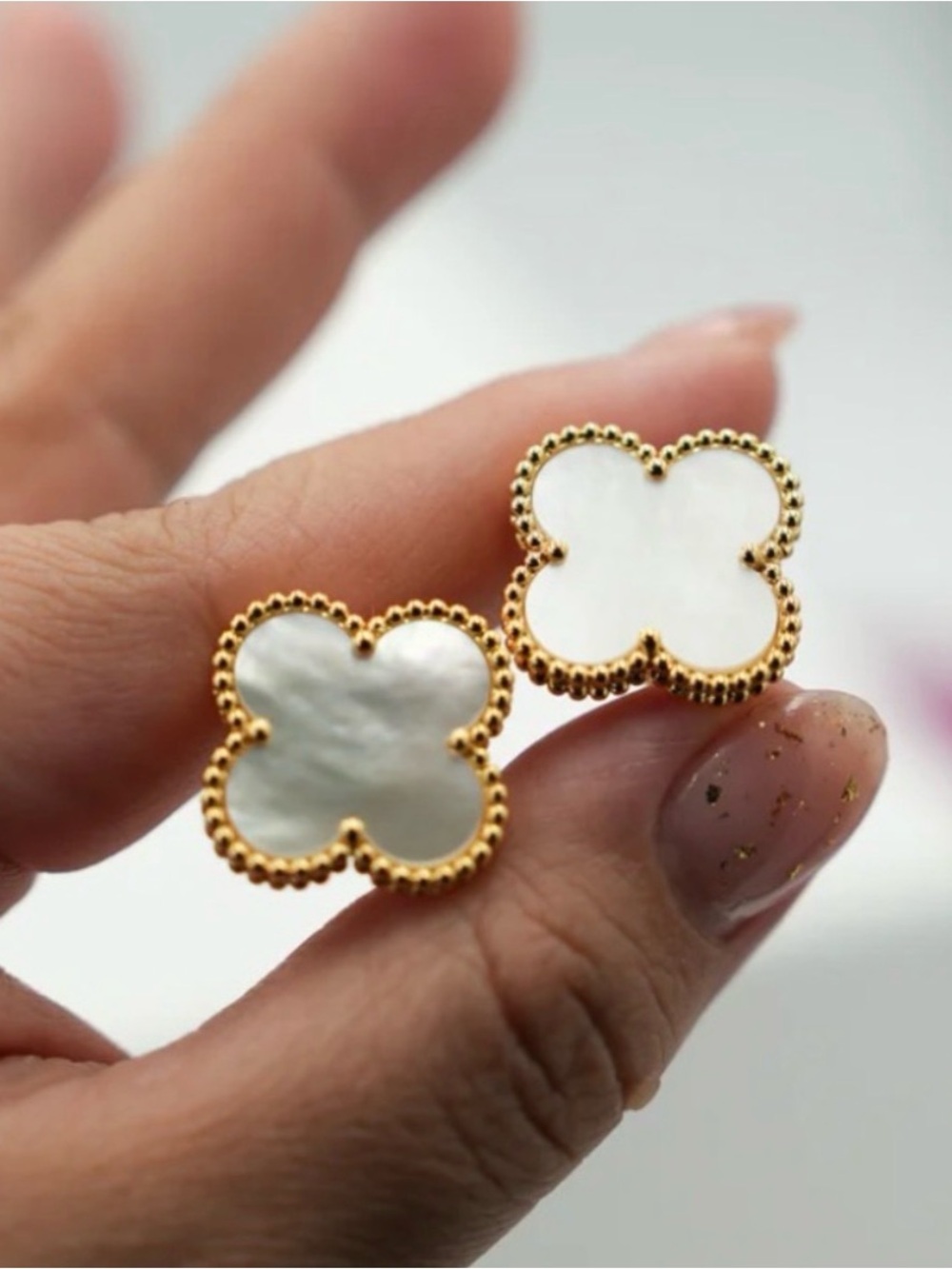 Gold-Plated Flower Studs -
Inspired by the Iconic flower
Look - Picture 2 of 6